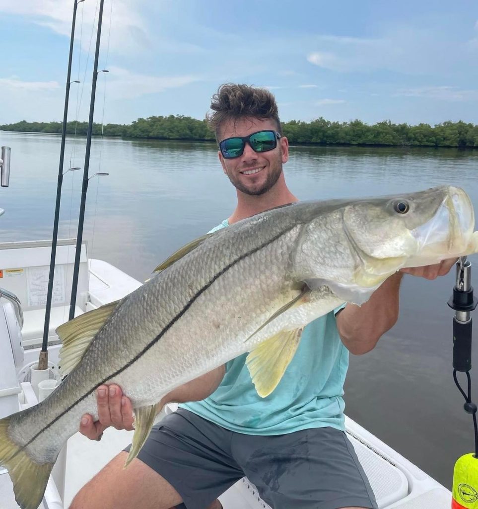 man-holding-big-fish