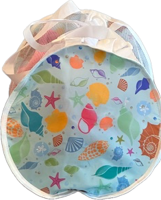 Colorful beach ball with seashell design and mesh netting.