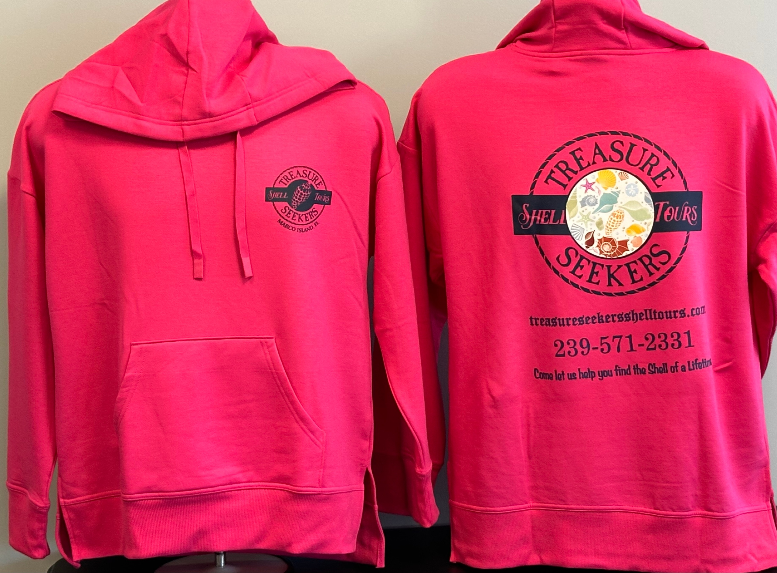 Two pink hoodies with Treasure Seekers logos on front and back.